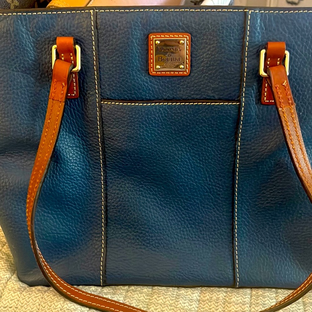 This essential tote, made from long-lasting pebble leather with a rich finish!